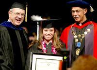 Nakima Mills of Rosebud, S.D., receives Creighton University's highest award, the Spirit of Creighton