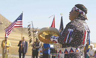 Nez Perce singer Pete Wilson, of Lapwai, Idaho, sings a flag song