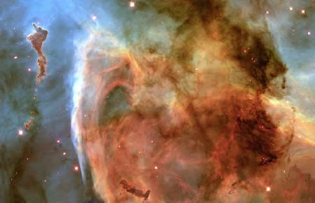 photo from NASA Light and Shadow in the Carina Nebula
