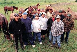 Descendants of Crazy Horse gather near their horses as they prepare for today’s ride to the Little Bighorn Battlefield National Monument. They rode horses 380 miles to camp at their grandfather’s campsite and planned to cross the Little Bighorn River on horseback at sunrise today.