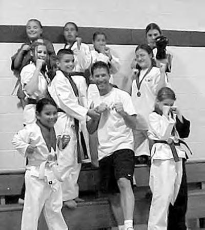 Nine martial arts students from the Lac du Flambeau Anishinaabe (Ojibwe) reservation