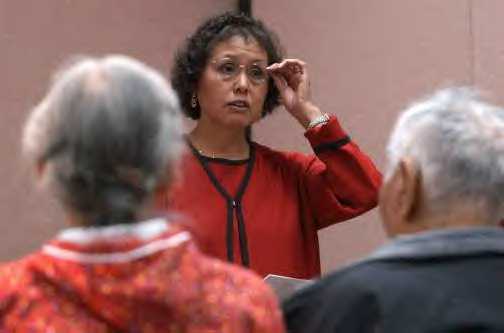 Loretta Outwater Cox speaks during an Alaska Federation of Natives workshop in October as her parents listen. Her book about her great-grandmother, "Winter Walk," was published last year. (Photo by Jim Lavrakas / Anchorage Daily News)