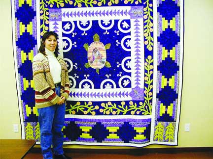 Carla Hemlock of Calico Cottage will have her quilt dubbed "Walking in the Footsteps of Our Ancestors