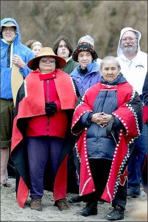 Mabel Norris, left, and Stella Monsegur, of the Haida Laas dance group, watch the launch of the "Ocean Spirit." 