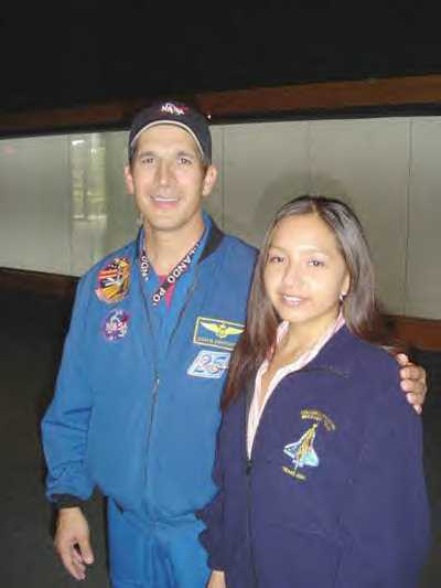 Astronaut John Herrington and Reynese Ridley, a member of the Columbia debris recovery team.