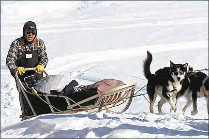 Emmitt Peters and his sled