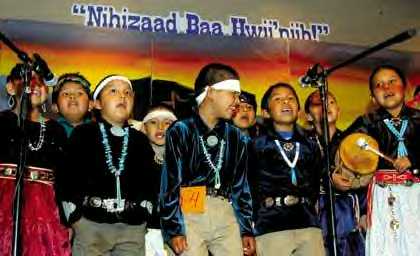 Window Rock Elementary School first graders sing during the Group Singing category at the Dine' Language Arts Fari Aapril 8 at Dine' College in Tsaile. (Times photo - Paul Natonabah)