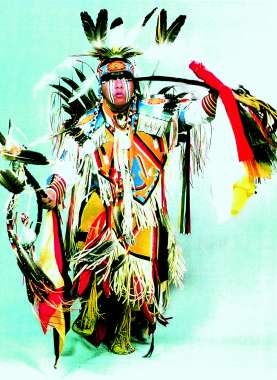 The searcher: A member of the American Indian Dance Theatre in traditional garb. Courtesy American Indian Dance Theatre