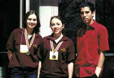 Young "Einsteins" Shelley Davis, Jenna Parisien and Daniel Concho participated in the science and engineering fair in Albuquerque, N.M. (Brenda Norrell / Indian Country Today)