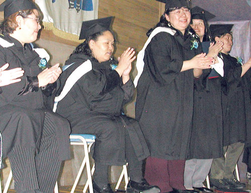 Grads Lucy Mary Qavvik, Isabel Takatak, Caroline Alariak, Mina Rumbolt, Mary Kavik, Dina Kavik and Lizzie Kavik clapped for joy after receiving their diplomas.