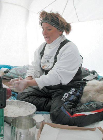 Pauline Alainga rustled up a batch of yummy bannock in the bannock-making competition. (PHOTO BY JANE GEORGE)