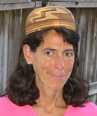 Professor Juliette Blevins, shown wearing a Yurok cap, is working with members of the Muwekma Ohlone tribe to revive their language, Chochenyo. (Photo by J.P. Blevins)