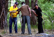 Tribal members use willow branches to construct the sweat lodge at last weekend's celebration in Southern Oregon.