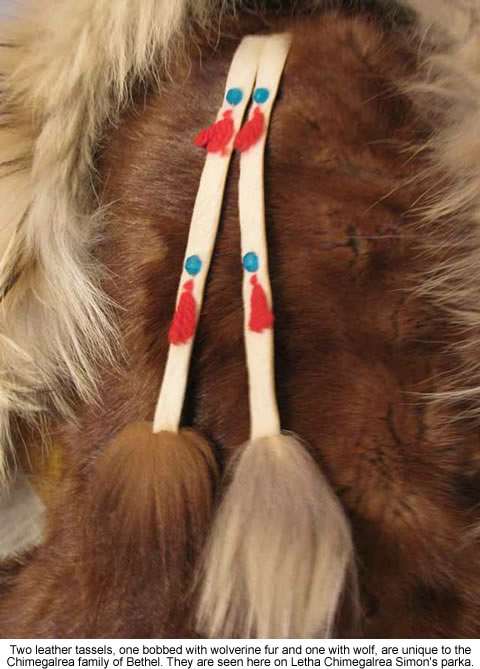 Two leather tassels, one bobbed with wolverine fur and one with wolf, are unique to the Chimegalrea family of Bethel. They are seen here on Letha Chimegalrea Simon's parka.
